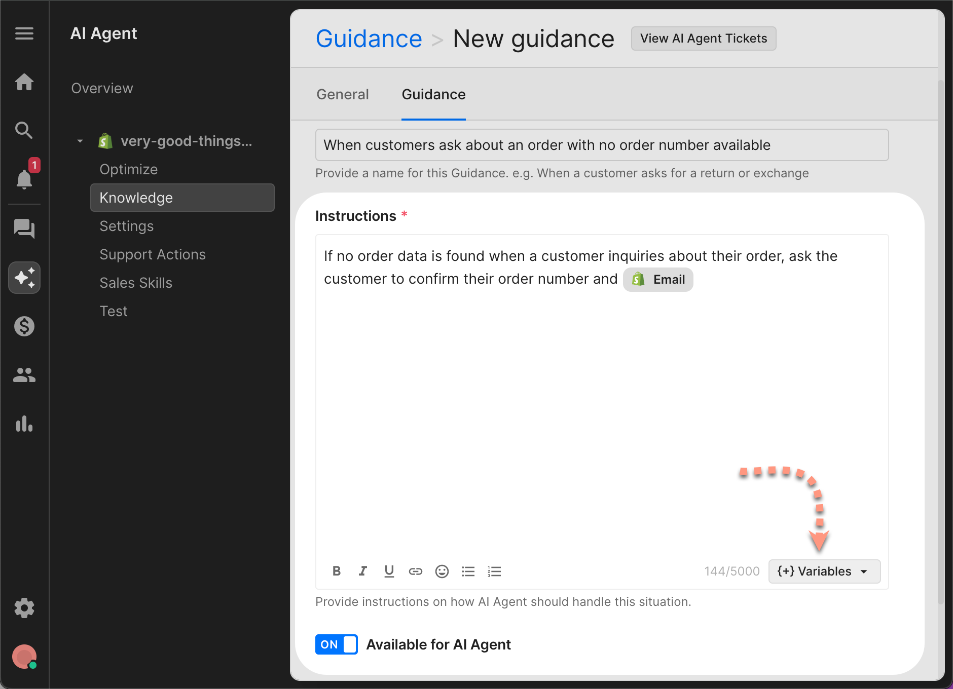 The “Guidance” tab in the Gorgias AI Agent interface, focusing on the instruction entry field. The same instruction text is shown: asking the customer to confirm their order number and email. This image includes a red dotted arrow pointing to the “+ Variables” dropdown in the bottom-right corner of the instruction box.