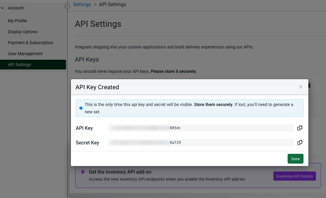The API Settings page in ShipStation. A modal window shows newly generated API and secret keys with a warning to store them securely. A copy button beside the API Key and Secret allows you to copy to your clipboard.