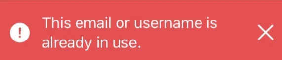 A red sign with white text Description automatically generated
