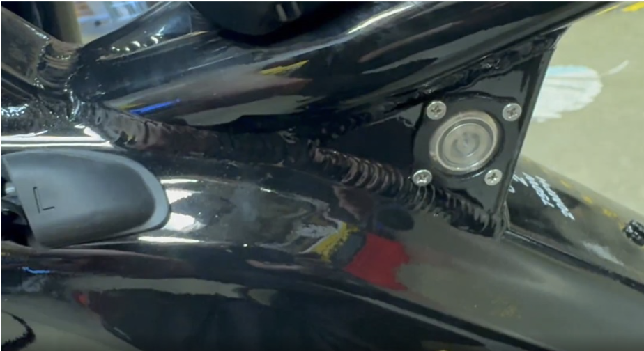 Pressing the main power button on the frame