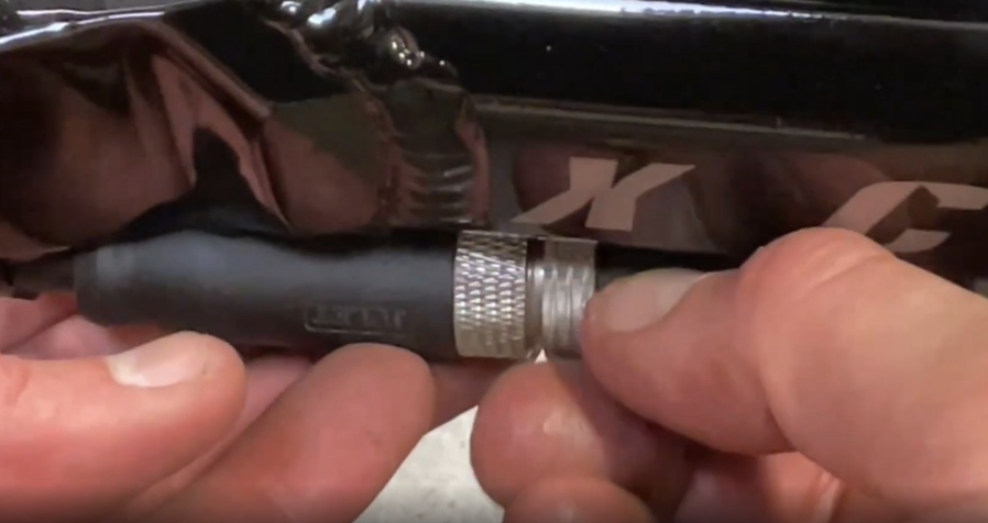 Motor cable barrel connector fully screwed together