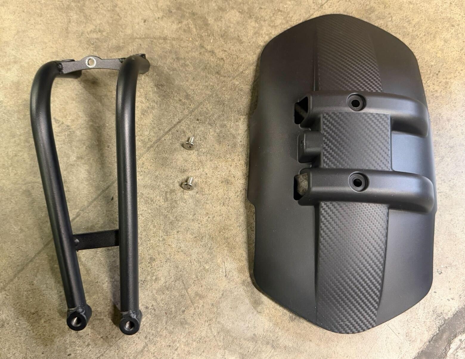 Unassembled fender arm and splash guard
