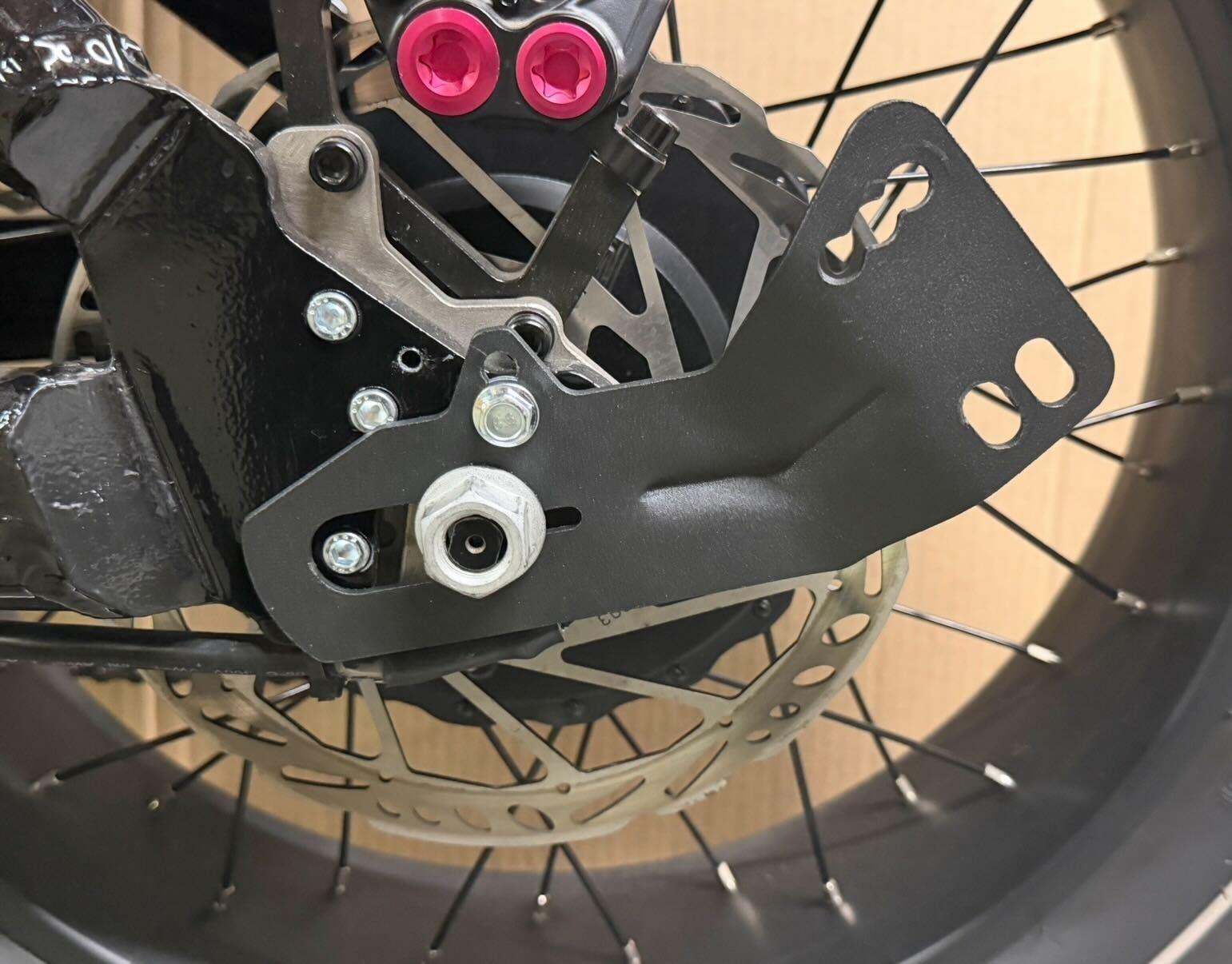 Bracket mounted over axle