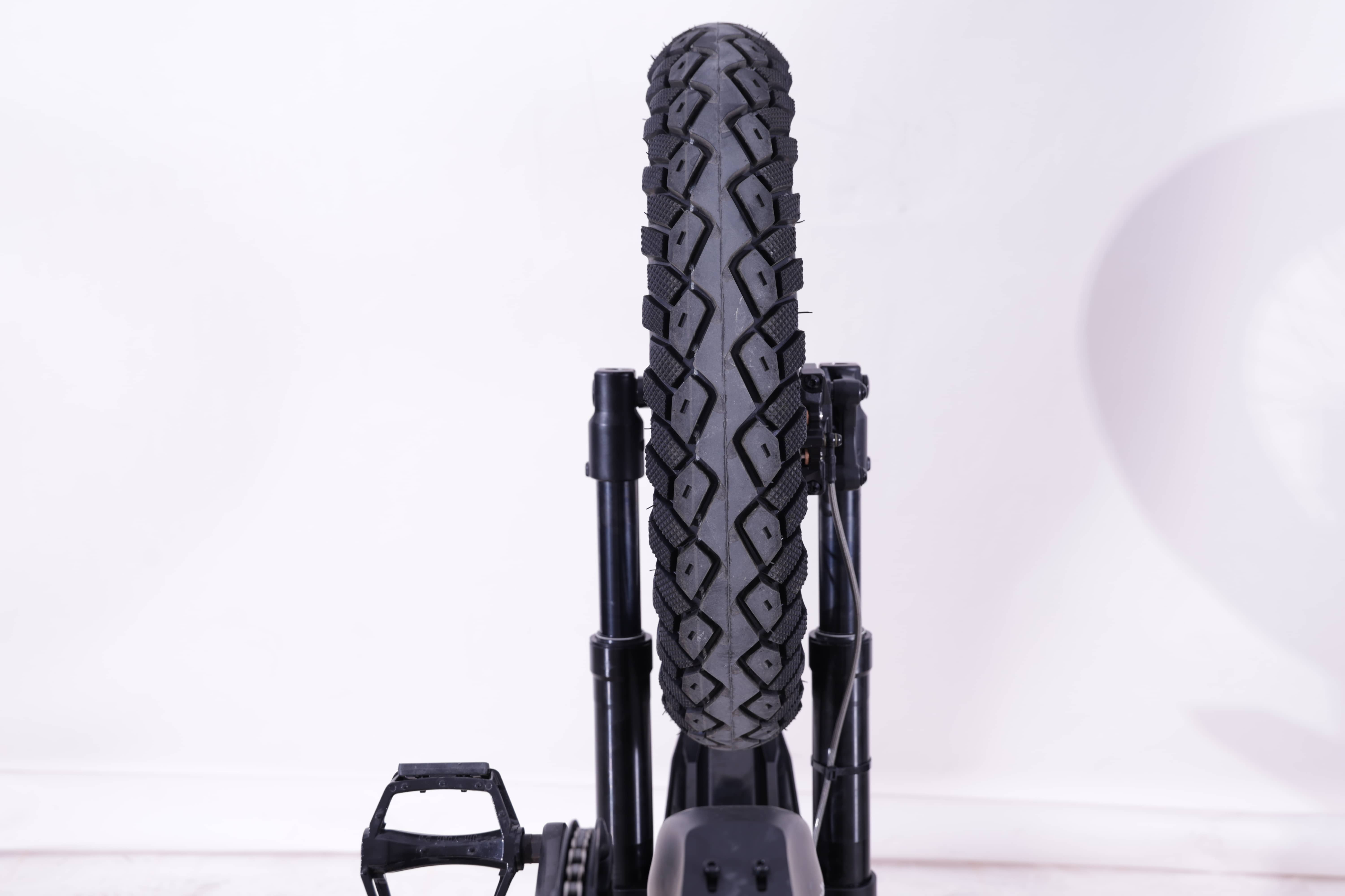 Completed Grizzly 72V PPB front wheel assembly, centered between the fork legs.