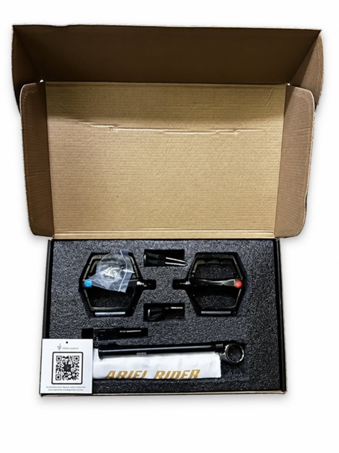 Accessory box. Both chargers are underneath the tray and are not shown.