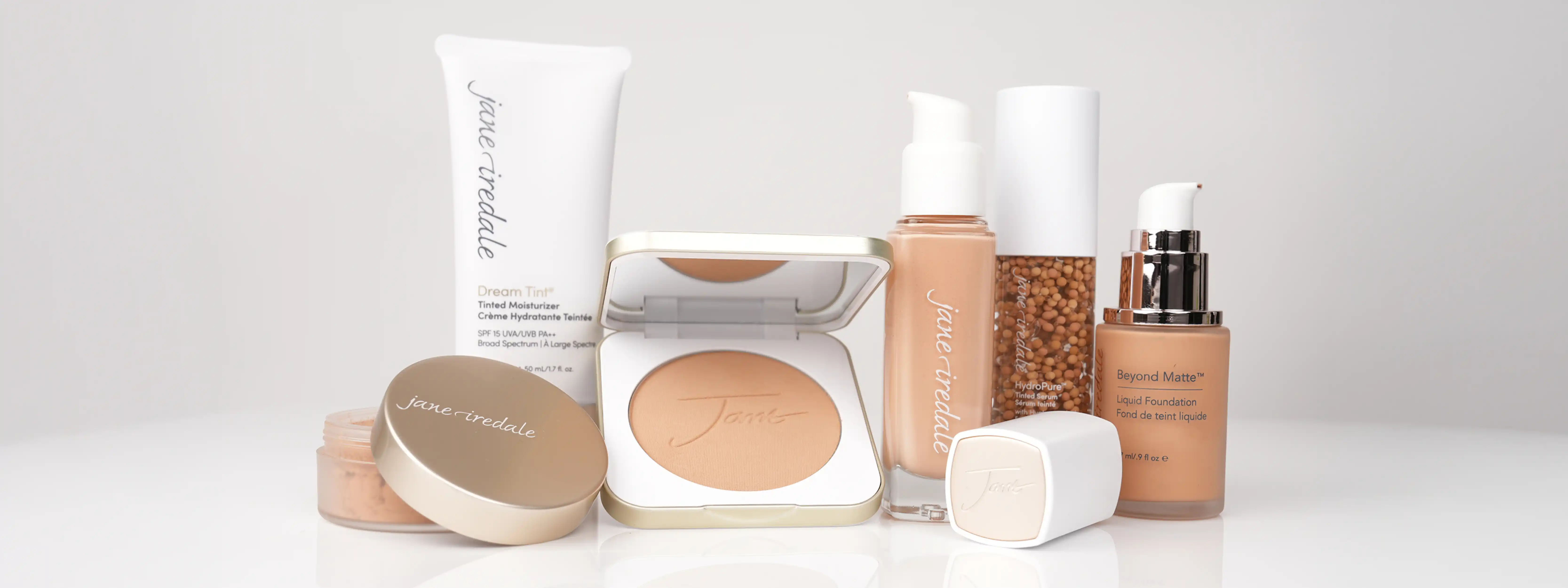 Jane Iredale Mineral Foundations lined up on light background