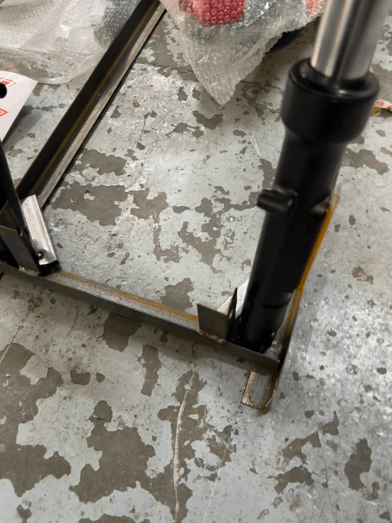 Metal frame on a concrete floor