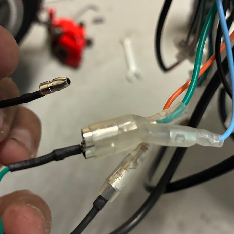 Close-up of electrical connectors and wires with a blurred background