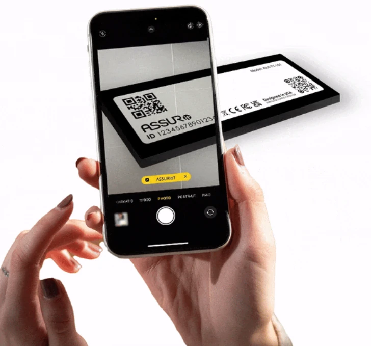 A phone is shown scaning the larger QR code on the top-left of the device