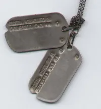 W.W. II Dog Tag showing notches