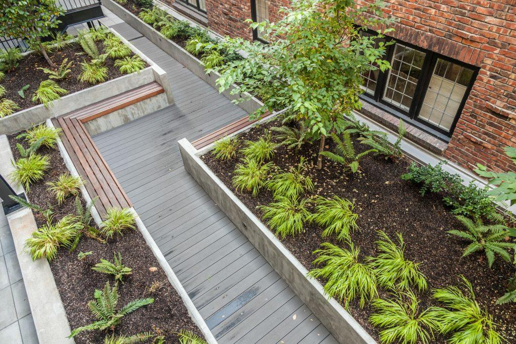 Decking pathway with raised beds
